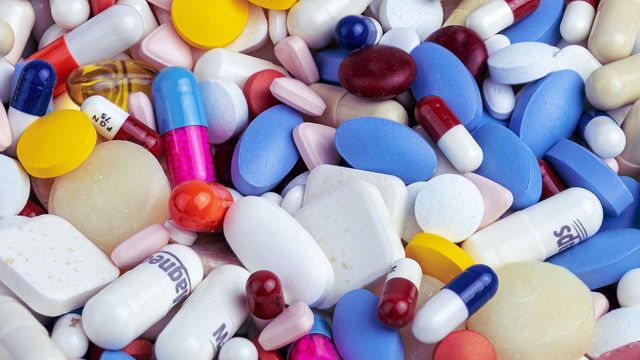 An assortment of pills in different sizes and colors.