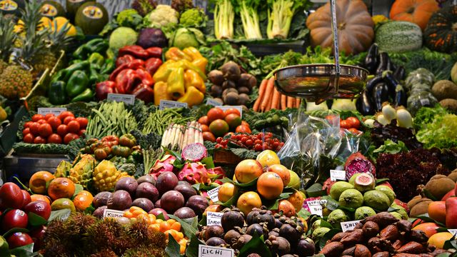 A stall full of fruit and veg.