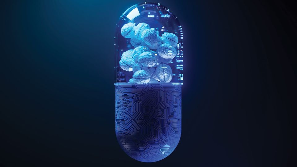 A drug capsule containing models of the human brain, representing neuro drug discovery.