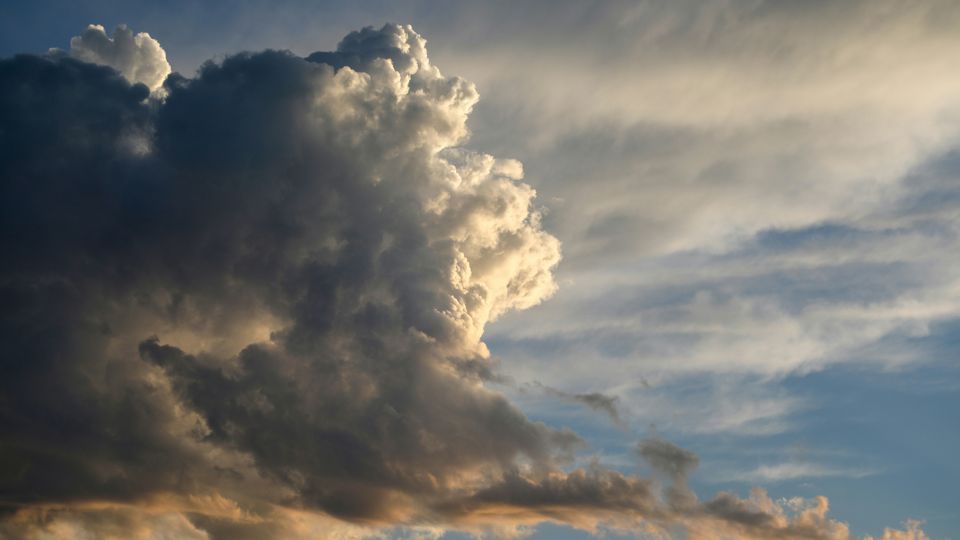 A cloud, black, grey and white.
