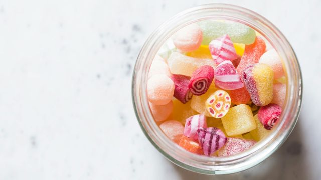 A top-down view of a jar of sweets. 