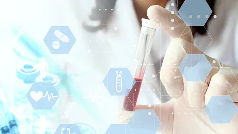 Life science researcher holding a blood sample vial with healthcare icons overlay.