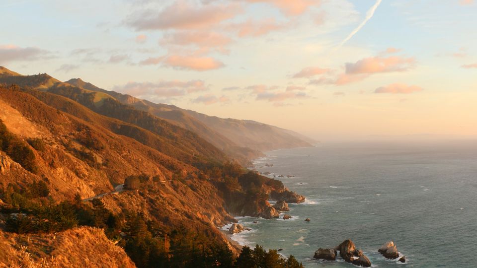 The rugged coastline of California, hills to the left of the frame, sea to the right.