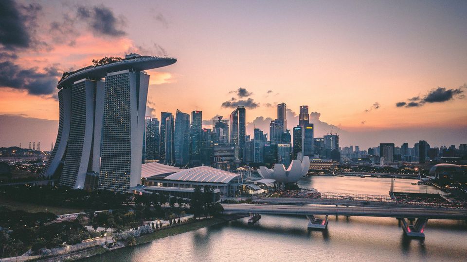The skyline of Singapore at dusk.