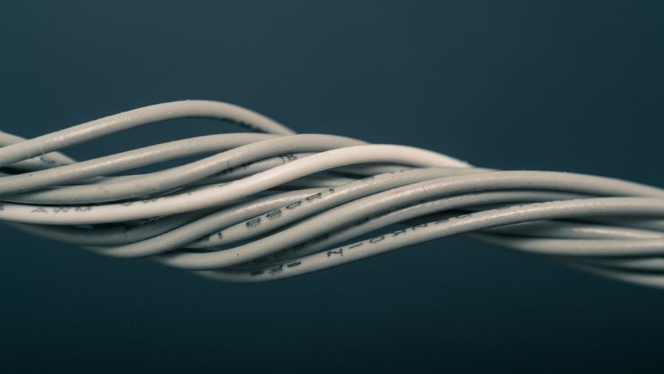 Gray wires twisted together.