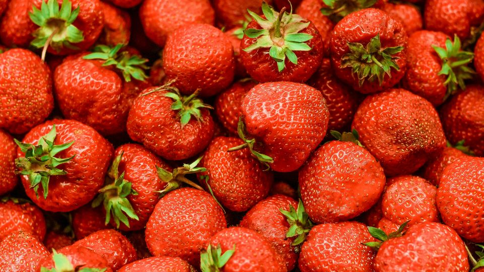 Strawberries in a pile.