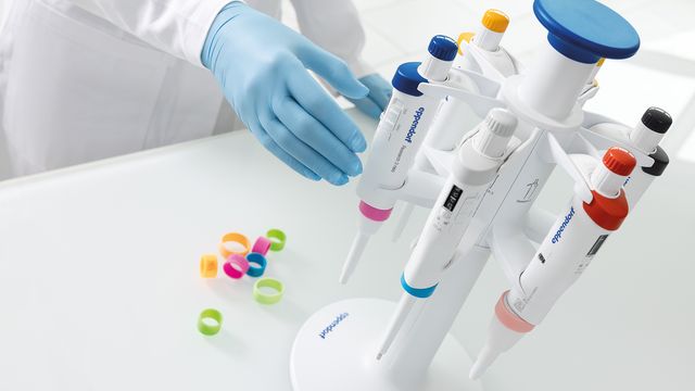 Eppendorf’s new generation of pipettes displayed in a laboratory with colorful accents. 