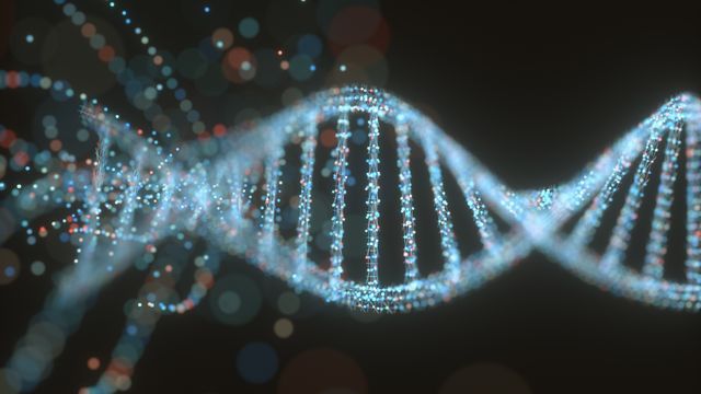 A DNA helix made up of blue and red glowing dots. 