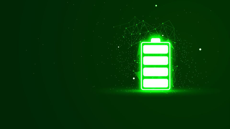 Illustration of a glowing green battery. 