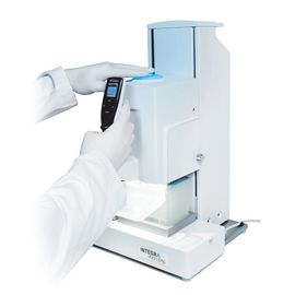 The Viaflo 96 on a white background with a Scientist using the machine 