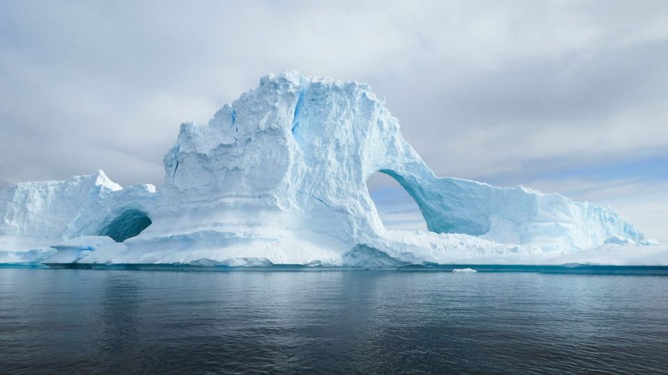 A large iceberg floating off the coast of the Antarctic Peninsula.