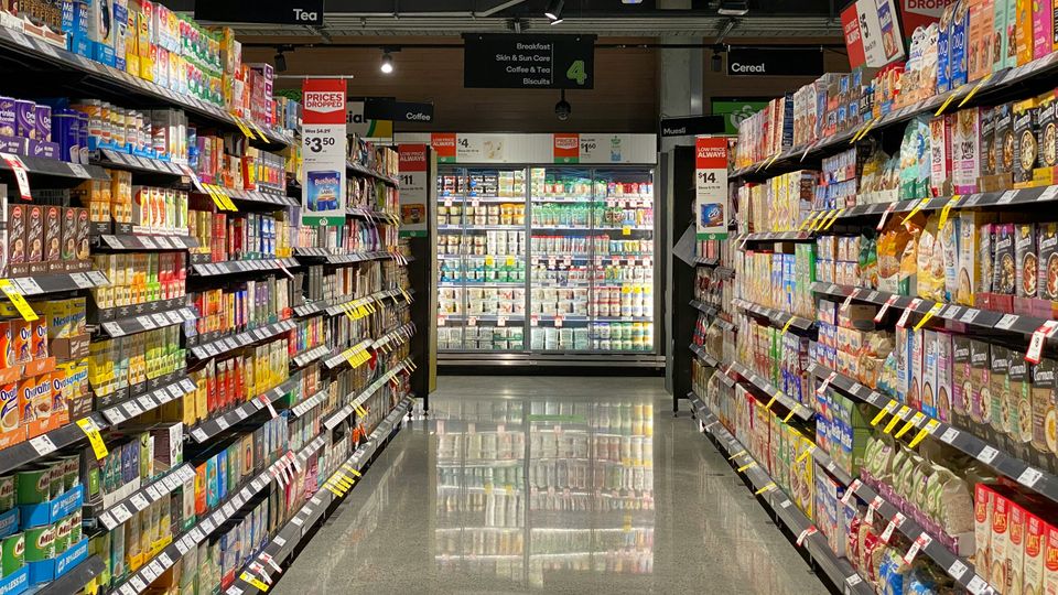 The view down a supermarket aisle.