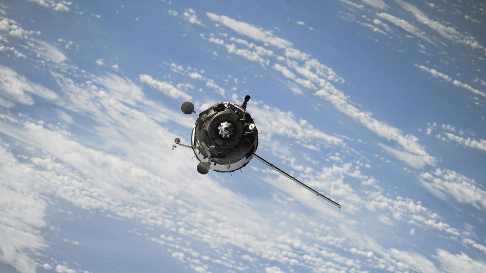 A satellite in Earth's orbit like the one used in Empa's X-ray imaging study.