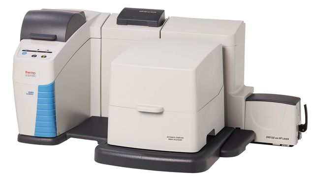 Benchtop Thermo Scientific DXR SmartRaman spectrometer with enclosed sampling compartment and side-mounted laser module. 
