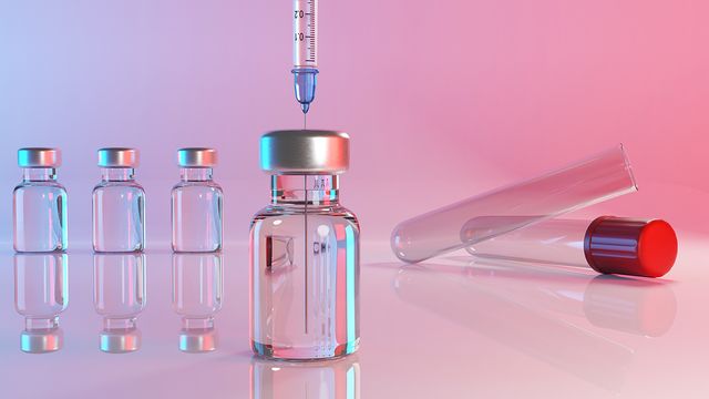 Illustration of vaccine vials and syringe representing high-throughput CE-SDS biopharmaceutical analysis. 