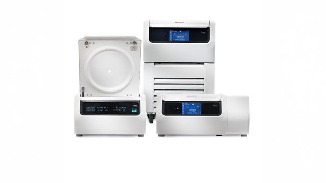 Three white benchtop laboratory instruments with digital touchscreens, arranged together on a white background. 