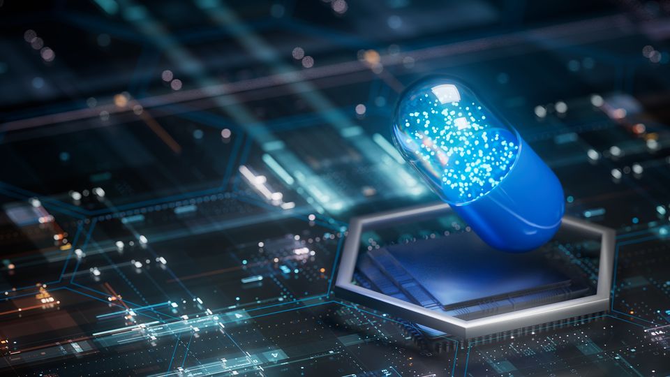 A drug capsule against a computer chip background, symbolizing machine learning in drug discovery. 