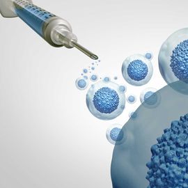 Illustration of a syringe and a group of cells, representing cell therapy. The cells are clear with a blue nucleus and are floating on a white background.  