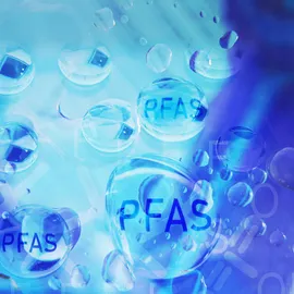 PFAS chemical compounds inside water bubbles, illustrating PFAS contamination in water.