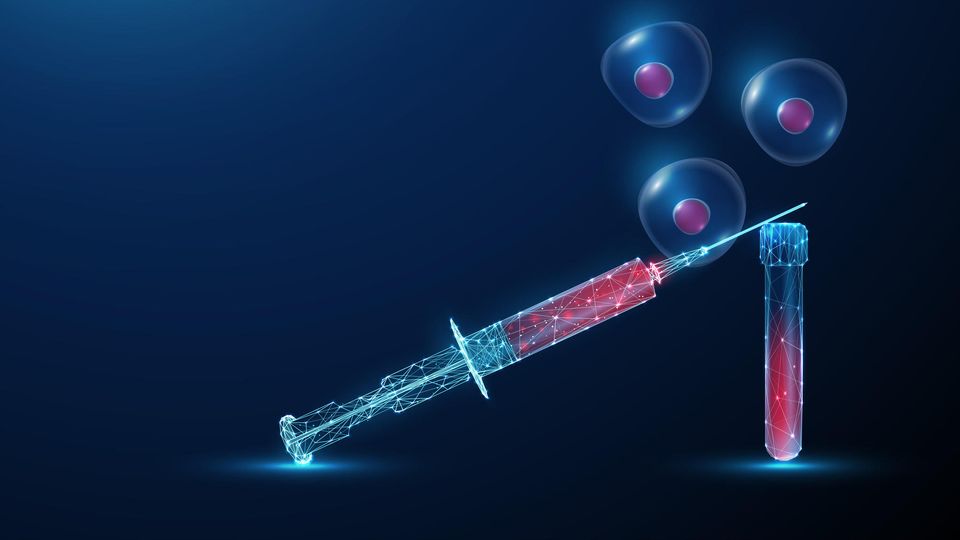 Syringe containing a red sample balanced on a test tube next to three floating human cells. 