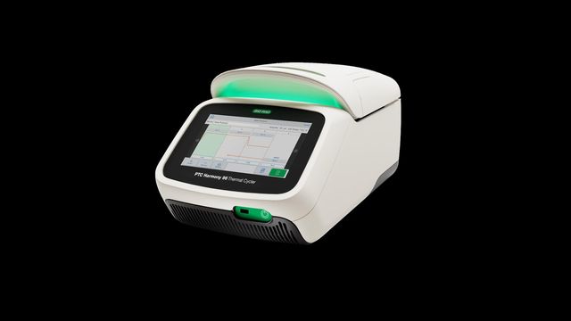 PTC Harmony thermal cycler with touchscreen interface for PCR amplification in laboratory. 