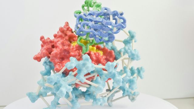 3D model of an antibody binding to HIV surface proteins in a molecular structure. 