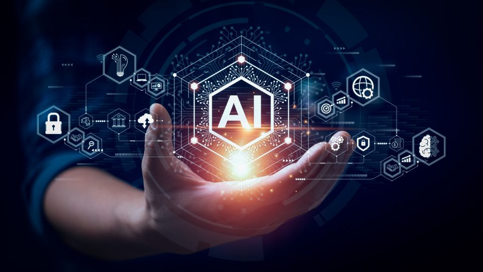 Human hand holding a hologram of AI icons. 