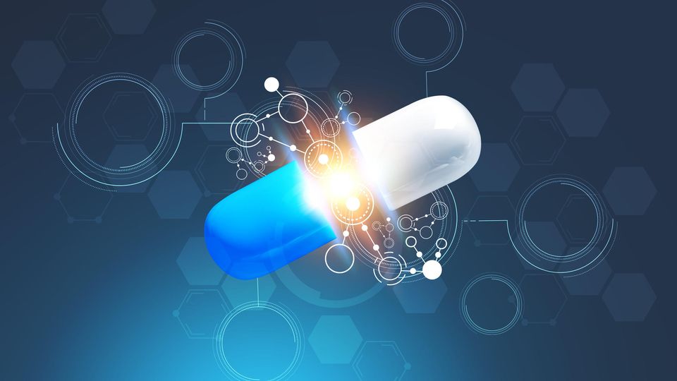 Illustration of a white and blue medicinal capsule split in half. Between the two halves are circles and lines representing molecules.