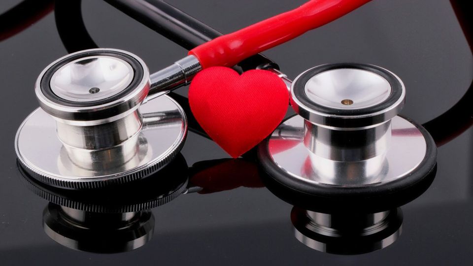 Stethoscope with a red heart symbol.