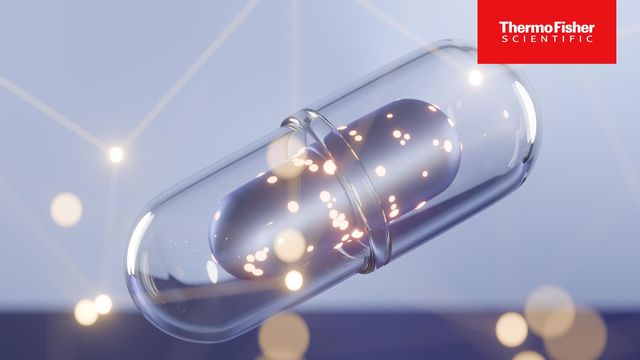 Bioprocessing capsule illustration with glowing particles inside a transparent pharmaceutical capsule with Thermo Fisher Scientific logo.  