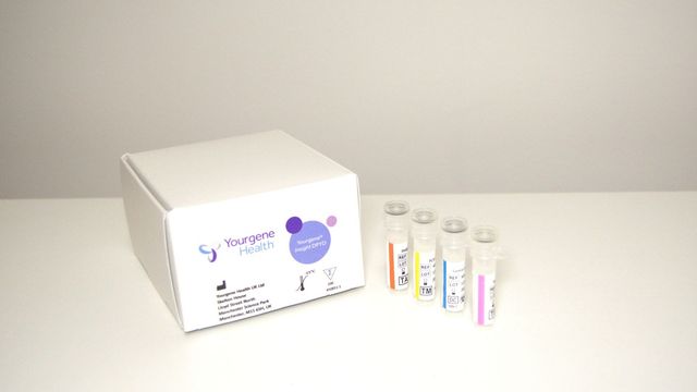 Medical testing kit with labeled sample vials beside a Yourgene Health diagnostic box. 