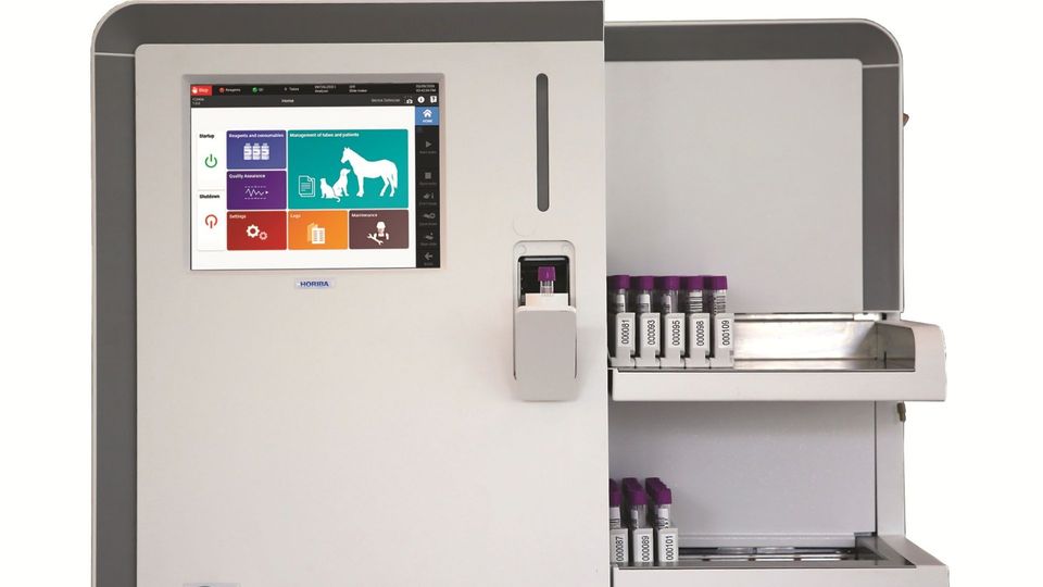 HORIBA Yumivet VH2500 veterinary hematology analyzer with touchscreen interface and automated blood sample tubes.