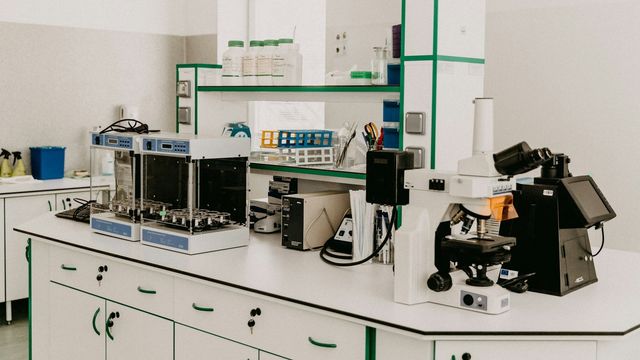 Modern biomedical laboratory with microscopes. 