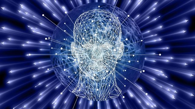 Abstract illustration of a digital human face with interconnected nodes. 