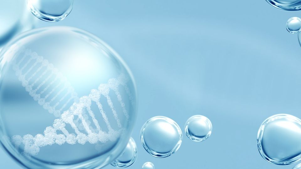 Various blue bubbles with one containing a DNA double helix.