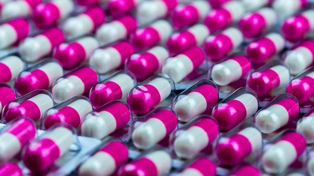 Capsules in blister packs representing automating continuous flow chemistry in pharmaceutical manufacturing. 