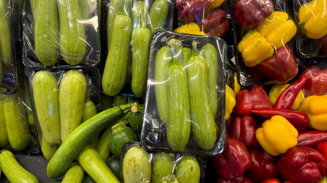 Vegetables packaged in shrink-wrap plastic packaging. 