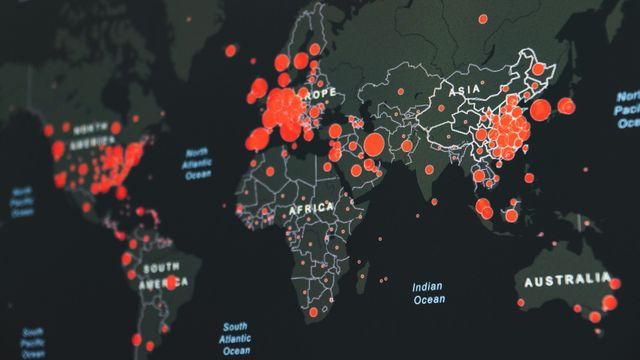 World map showing global locations highlighted with red markers. 