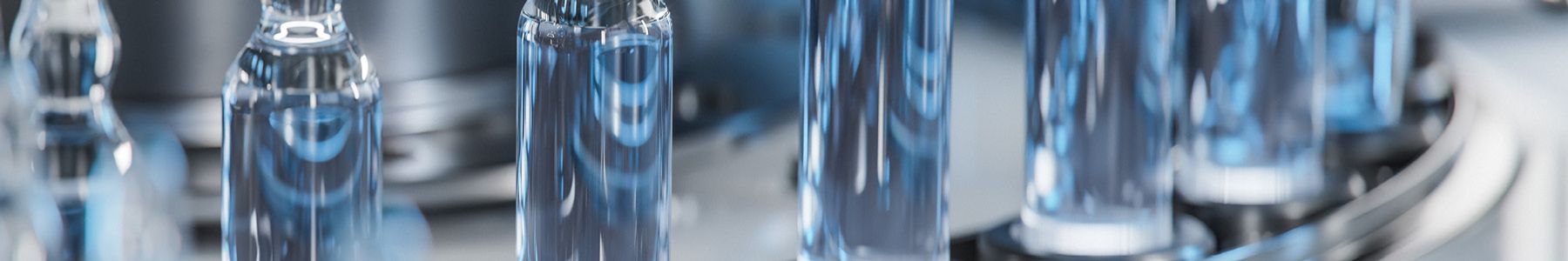 Medical ampoules representing the path from drug discovery to clinical impact 