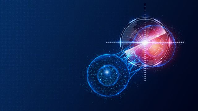 Illustration of a cancer cell covered by a target marker. The cell appears to be glowing. 