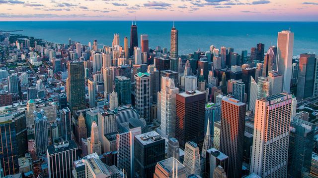 Aerial view of Chicago buildings and skyscrapers along Lake Michigan. 