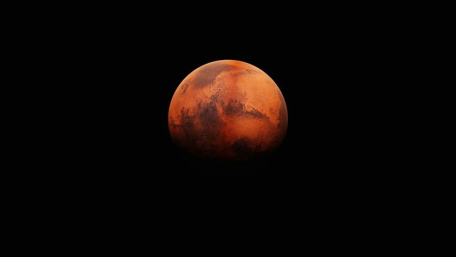 Mars planet against a black background. 