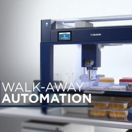 Gilson automated liquid handling system on a lab bench with the text “Walk-Away Automation.” 
