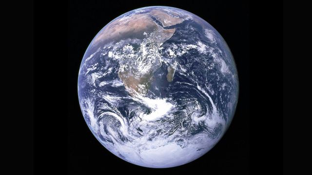 A satellite photograph of the Earth. 