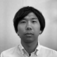 A greyscale headshot of Naoto Watamura