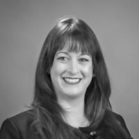 A greyscale headshot of Chelsea Pratt