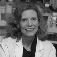 A greyscale headshot of Christine Metz