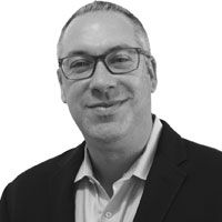 A greyscale headshot of Jack Hoppin