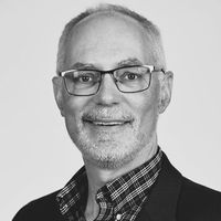 A greyscale headshot of Chris Stumpf