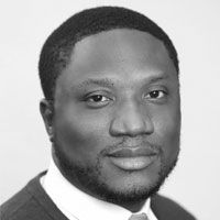 A greyscale headshot of  Mustapha Abubakar